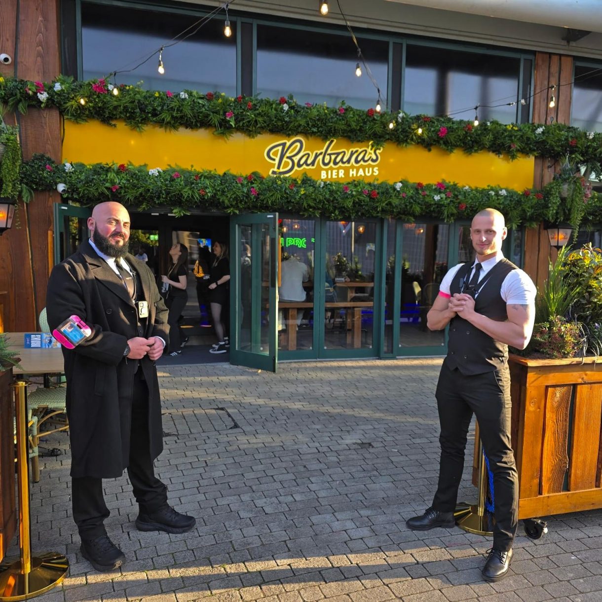 2 Security Doormen outside Barbara Haus
